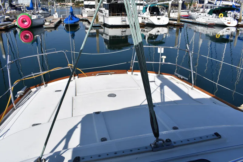 Slide: The Image of Beneteau Oceanis 42CC 2002 in marina, deck view. - 14