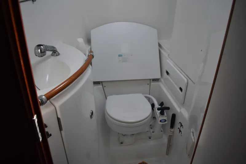 Slide: The Image of Interior of 2002 Beneteau Oceanis 42CC, bathroom with toilet and sink. - 24