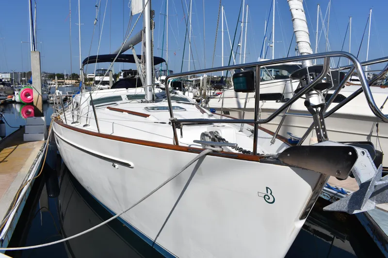 Slide: The Image of 2002 Beneteau Oceanis 42CC sailboat docked in marina. - 3