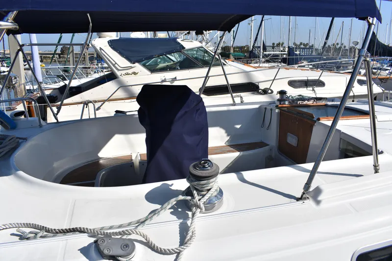 Slide: The Image of Beneteau Oceanis 42CC 2002, sailboat cockpit in marina. - 34