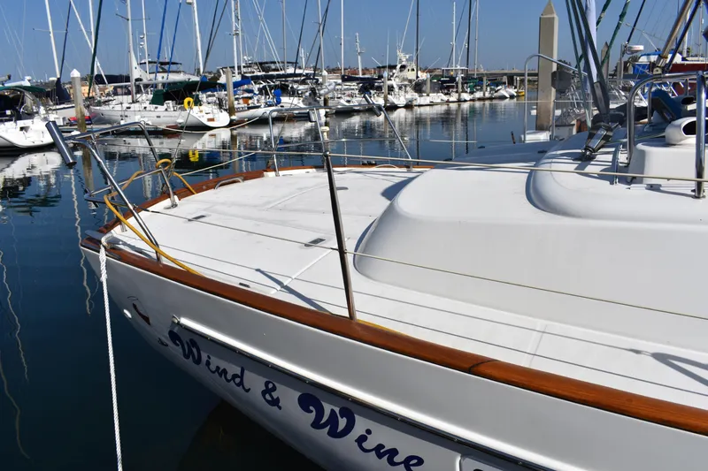 Slide: The Image of Beneteau Oceanis 42CC 2002 docked, sleek design. - 37
