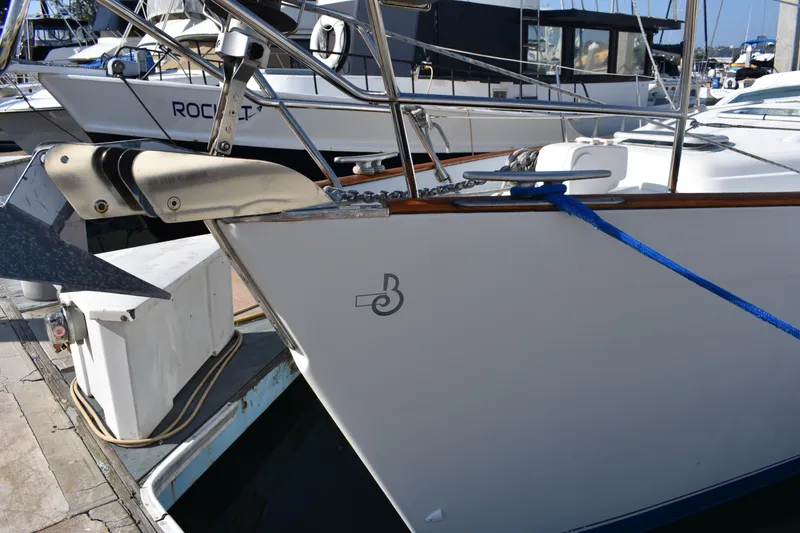 Slide: The Image of Beneteau Oceanis 42CC 2002 docked with blue rope. - 38