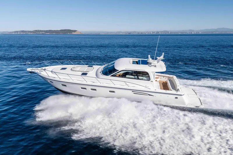 Slide: The Image of 2006 Tiara Yachts 5200 Sovran Salon cruising on open water. - 1