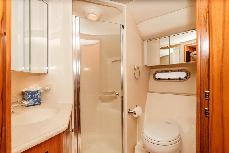 Slide: The Image of Luxurious bathroom in 2006 Tiara Yachts 5200 Sovran Salon with shower and vanity. - 27