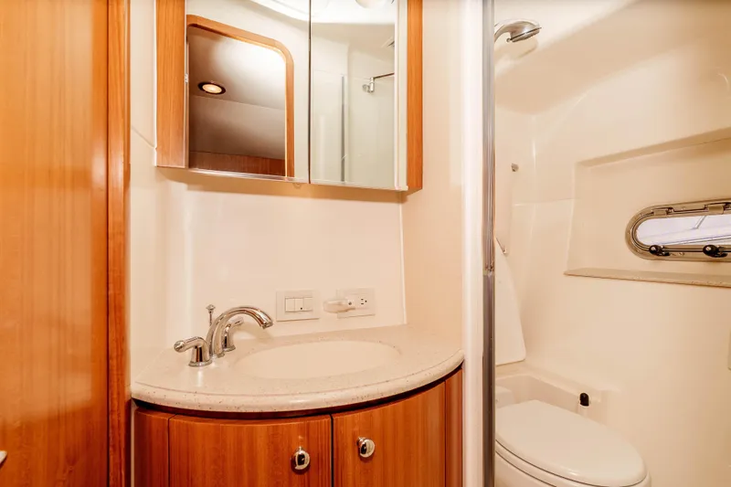 Slide: The Image of Luxurious bathroom in 2006 Tiara Yachts 5200 Sovran Salon with modern fixtures. - 31