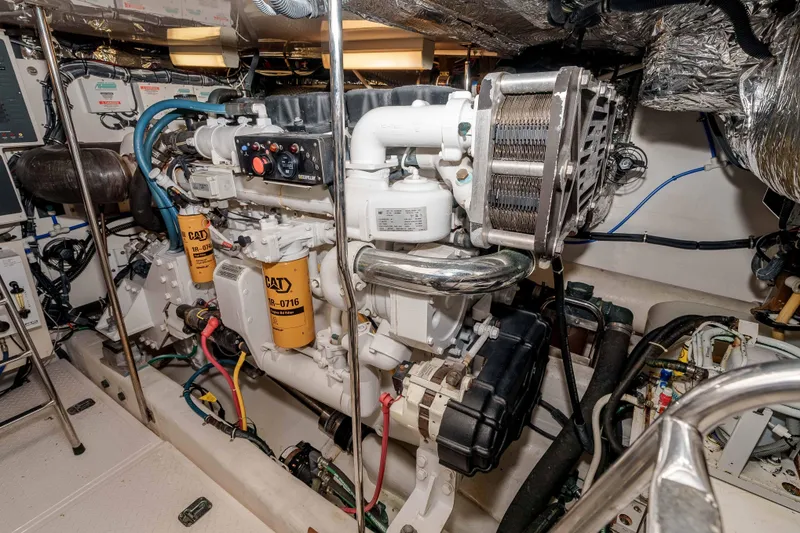 Slide: The Image of Engine room of 2006 Tiara Yachts 5200 Sovran Salon, featuring CAT machinery. - 34