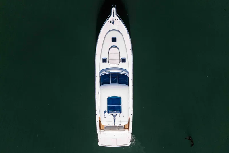 Slide: The Image of Aerial view of 2006 Tiara Yachts 5200 Sovran Salon on calm water. - 41