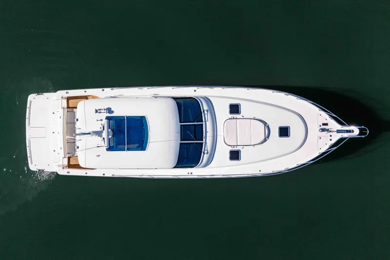 Slide: The Image of Aerial view of 2006 Tiara Yachts 5200 Sovran Salon on calm water. - 42