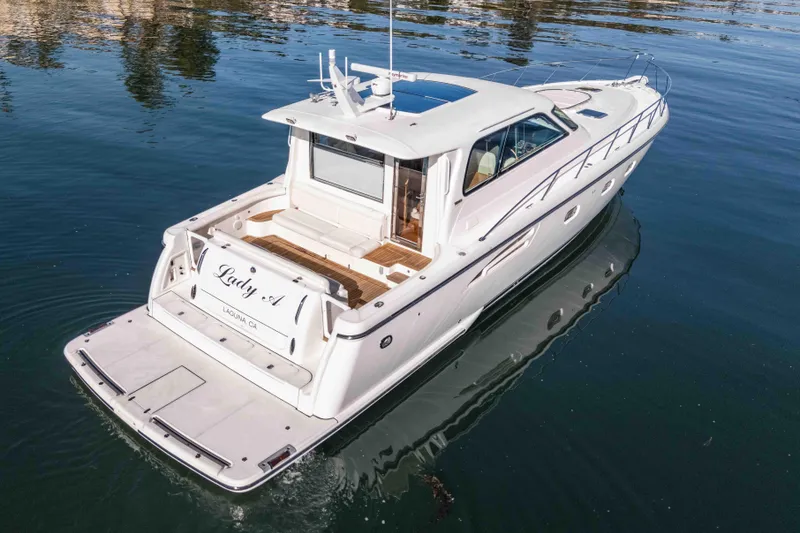 Slide: The Image of 2006 Tiara Yachts 5200 Sovran Salon cruising on calm water. - 8