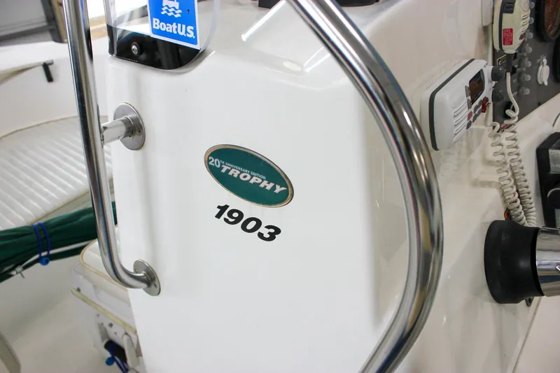 Slide: The Image of 2003 Trophy 1903 Center Console boat interior with steering wheel and control panel. - 17