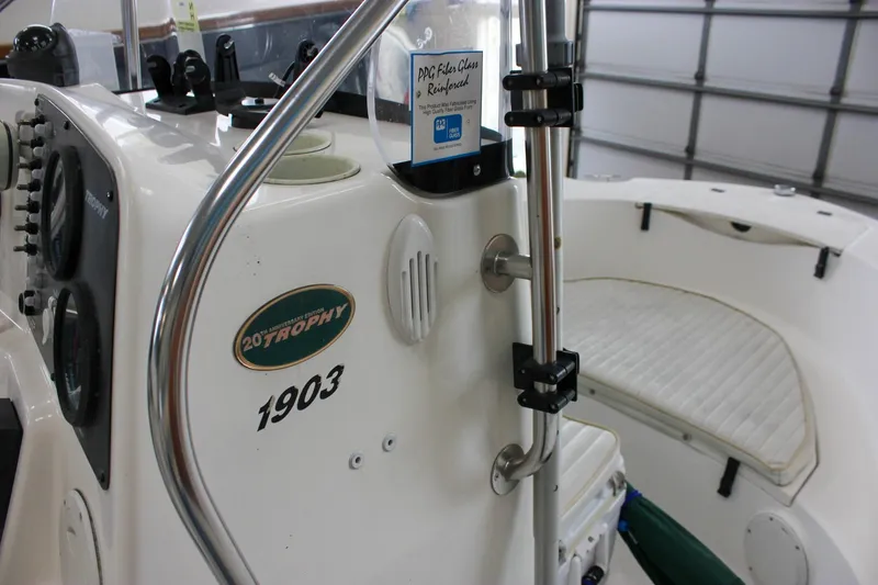 Slide: The Image of 2003 Trophy 1903 Center Console boat interior with control panel and seating. - 21