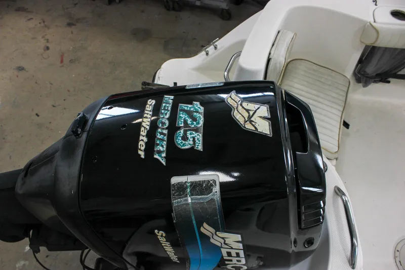 Slide: The Image of Mercury 125 Saltwater outboard motor on 2003 Trophy 1903 Center Console boat. - 27