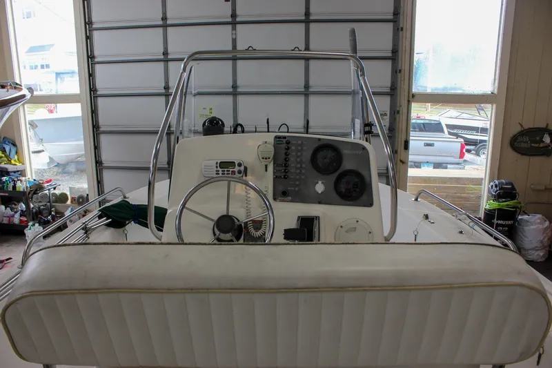 Slide: The Image of 2003 Trophy 1903 Center Console boat interior in a garage setting. - 4