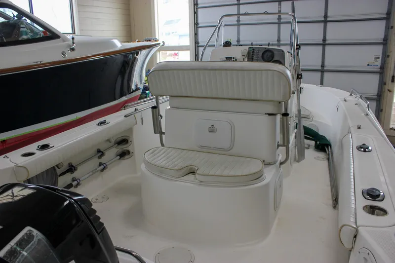 Slide: The Image of 2003 Trophy 1903 Center Console boat interior with seating and control panel. - 7