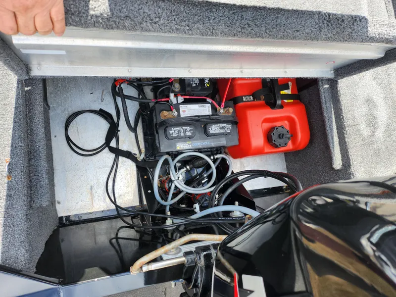 Slide: The Image of 2021 Tracker Bass Tracker Classic XL boat battery and fuel compartment. - 21