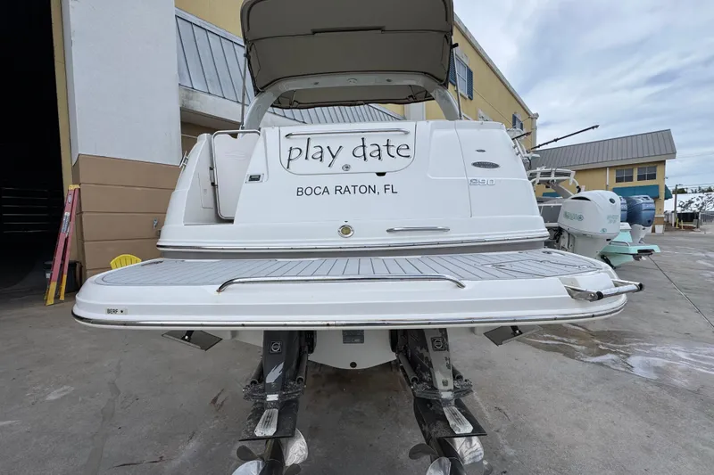 Slide: The Image of 2009 Chaparral Signature 290 boat docked in Boca Raton, FL, named "Play Date". - 7
