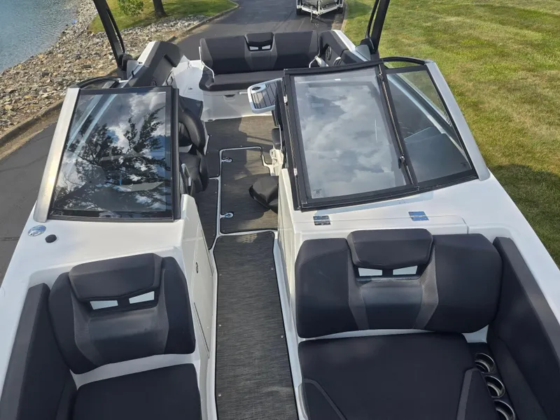 Slide: The Image of 2021 Scarab 285 ID boat interior with sleek seating and modern design. - 21