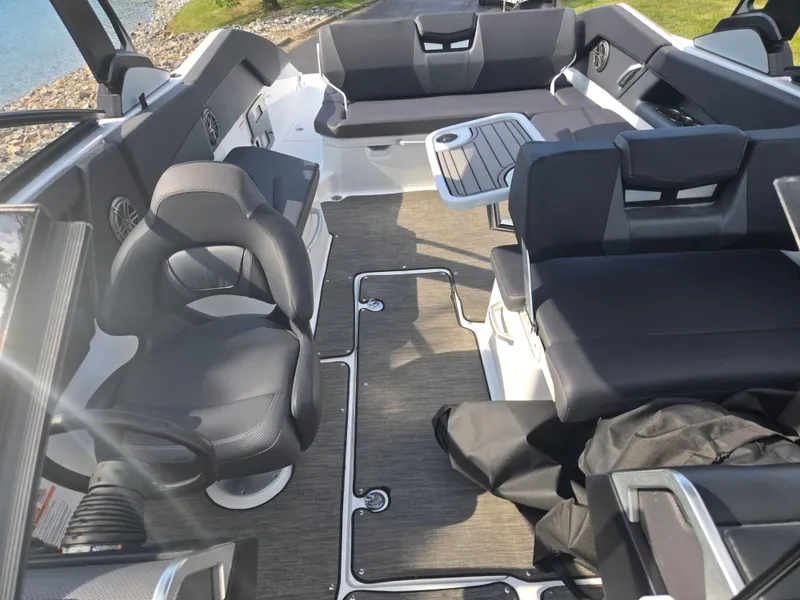 Slide: The Image of Interior of a 2021 Scarab 285 ID boat with seating and table. - 22