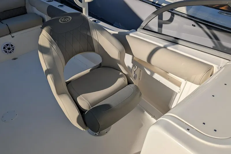 Slide: The Image of 2026 Key West 239 DFS boat interior with comfortable seating and modern design. - 16