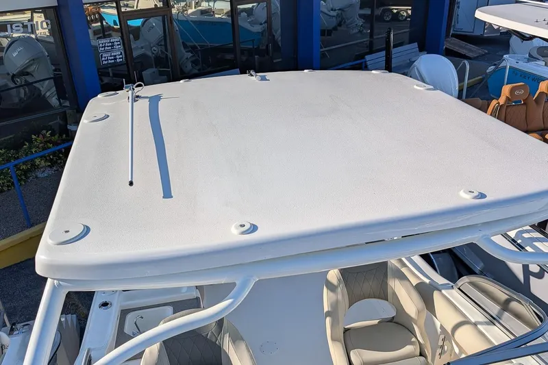 Slide: The Image of 2026 Key West 239 DFS boat with a spacious white deck and comfortable seating. - 21