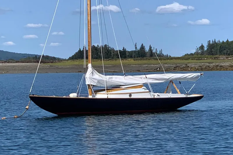 The Image of Classic Dark Harbor 17 sailboat from 1919 on calm waters. - 0