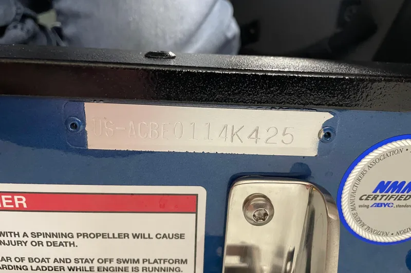 Slide: The Image of 2025 Alumacraft Trophy 185X Sport boat identification number and certification label. - 16