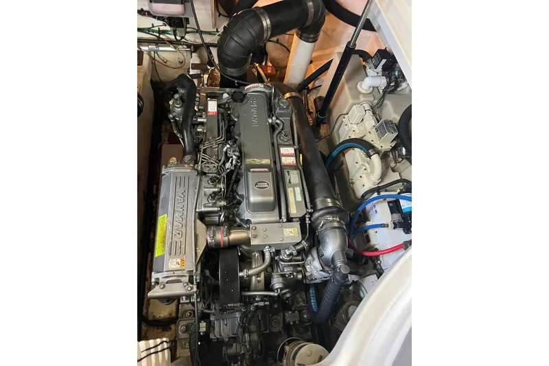 Slide: The Image of Engine compartment of a 2006 Sea Ray 340 Sundancer with Yanmar engine. - 12