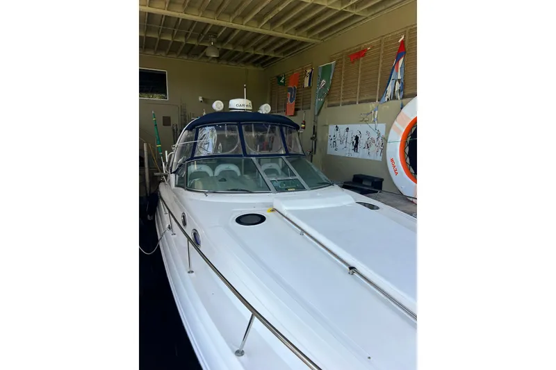Slide: The Image of 2006 Sea Ray 340 Sundancer in a covered storage area. - 7
