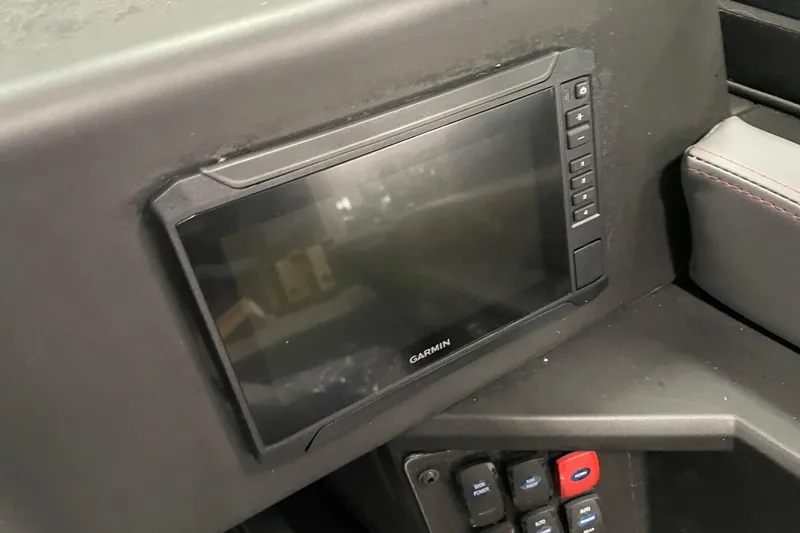 Slide: The Image of Garmin display in 2025 Alumacraft Trophy 185X Sport boat dashboard. - 11