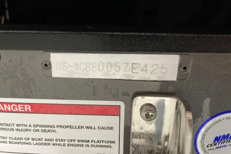 Slide: The Image of 2025 Alumacraft Trophy 185X Sport boat identification plate with warning label. - 17