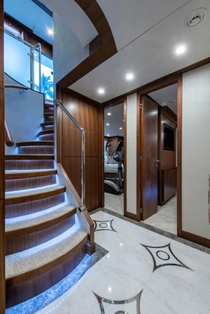 Slide: The Image of Luxurious interior of 2020 Hargrave G120 yacht with elegant staircase and modern design. - 16