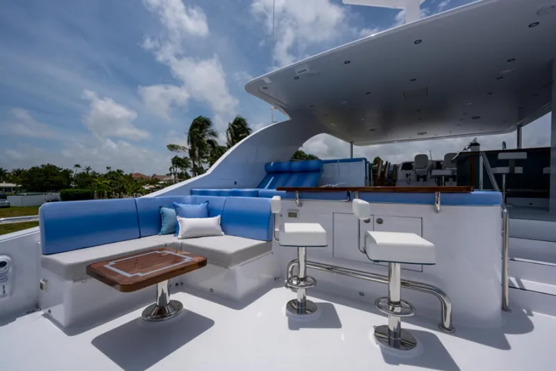 Slide: The Image of Luxurious outdoor seating area on a 2020 Hargrave G120 yacht. - 2