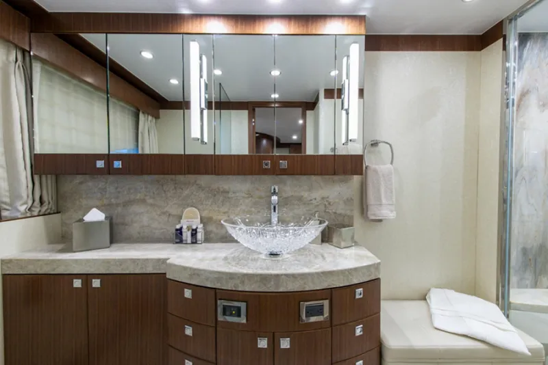 Slide: The Image of Luxurious bathroom in a 2020 Hargrave G120 yacht with modern fixtures and elegant design. - 23