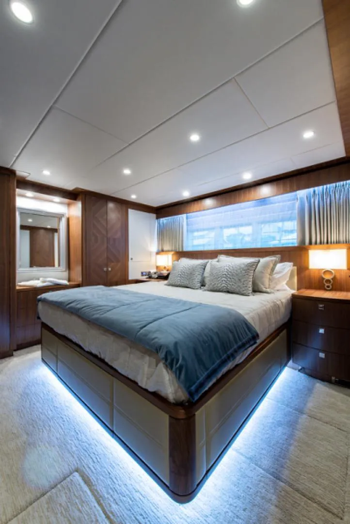 Slide: The Image of Luxurious bedroom interior of 2020 Hargrave G120 yacht with modern lighting. - 29