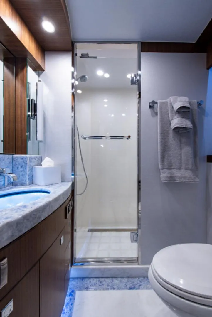 Slide: The Image of Modern bathroom in 2020 Hargrave G120 yacht with glass shower and marble countertop. - 35