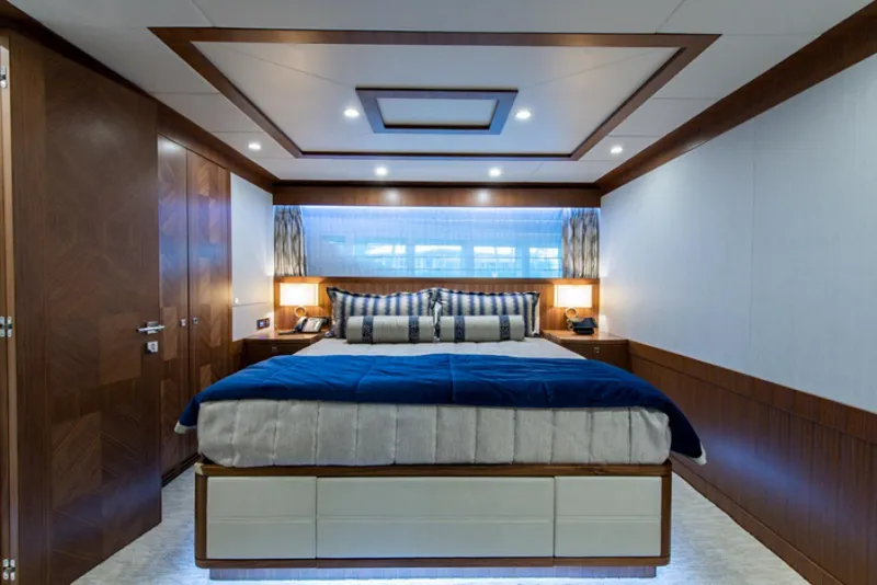 Slide: The Image of Luxurious bedroom interior of 2020 Hargrave G120 yacht with modern design and ambient lighting. - 37