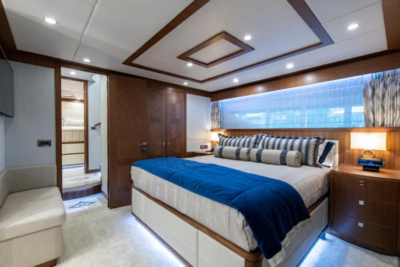 Slide: The Image of Luxurious bedroom interior of 2020 Hargrave G120 yacht with modern design and ambient lighting. - 38