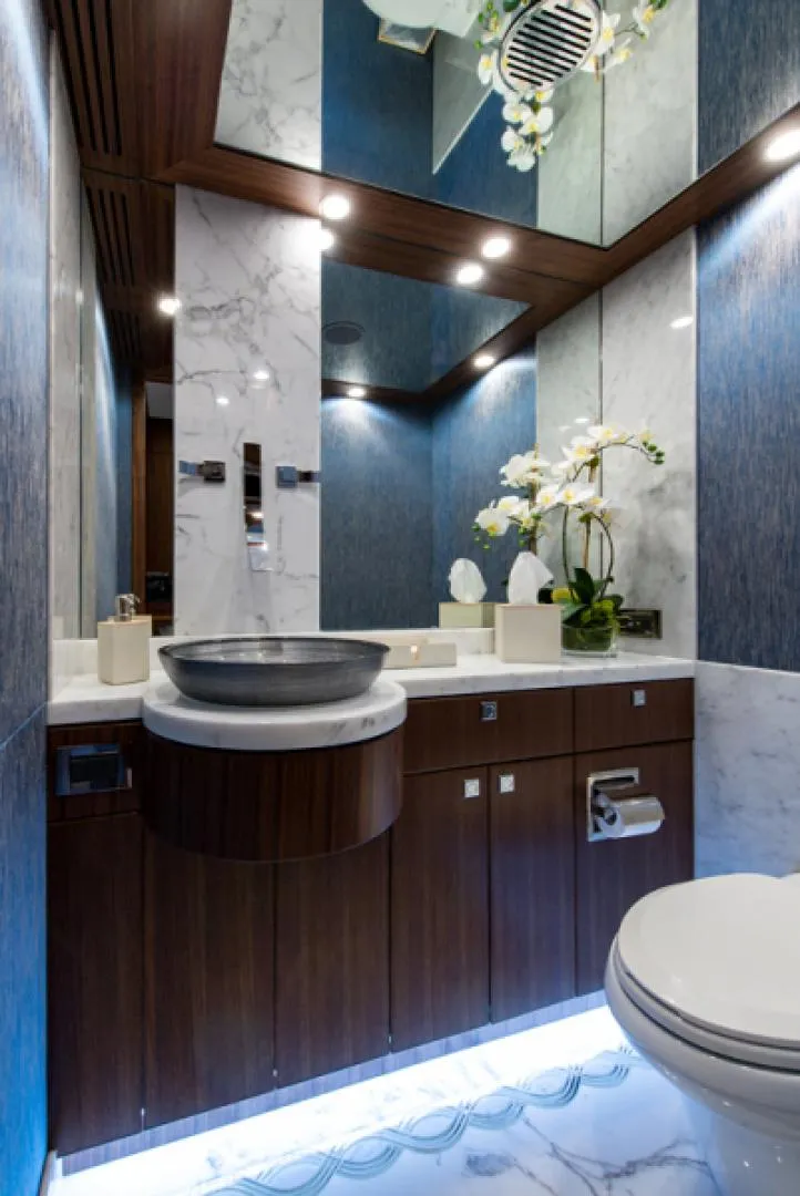 Slide: The Image of Luxurious bathroom in a 2020 Hargrave G120 yacht with modern fixtures and elegant decor. - 9