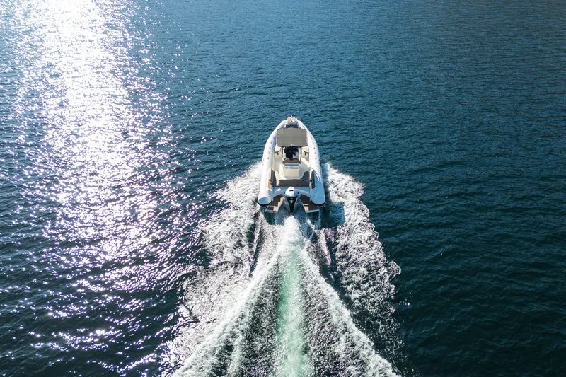 Slide: The Image of Aerial view of 2026 BWA GTO 308 boat cruising on open water. - 3