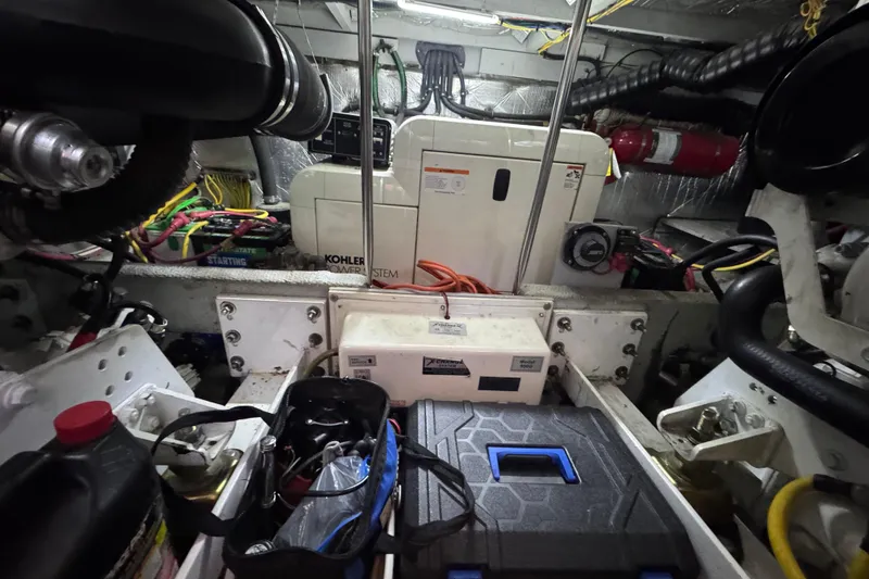 Slide: The Image of Engine room of 2003 Silverton 410 Sport Bridge with Kohler power system and equipment. - 130