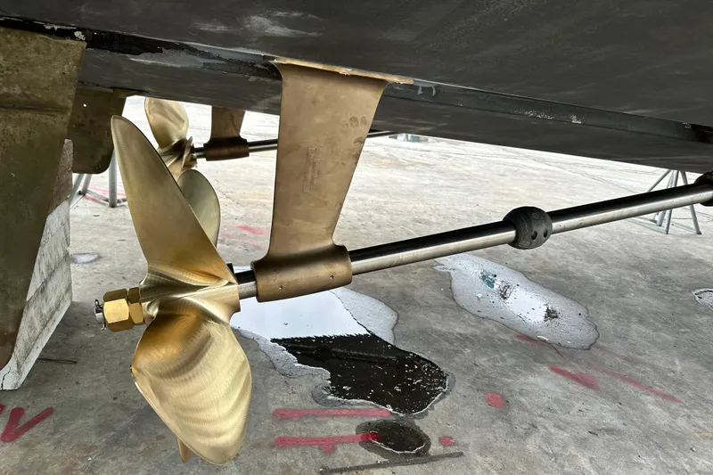 Slide: The Image of Propeller and shaft of a 2003 Silverton 410 Sport Bridge boat on dry dock. - 137