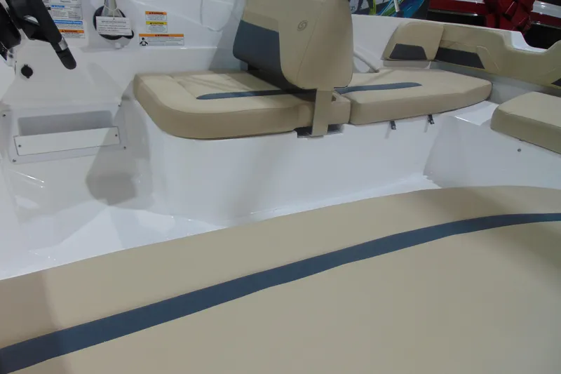 Slide: The Image of Interior view of 2026 Hurricane SunDeck Sport 185 OB boat with beige seating. - 19