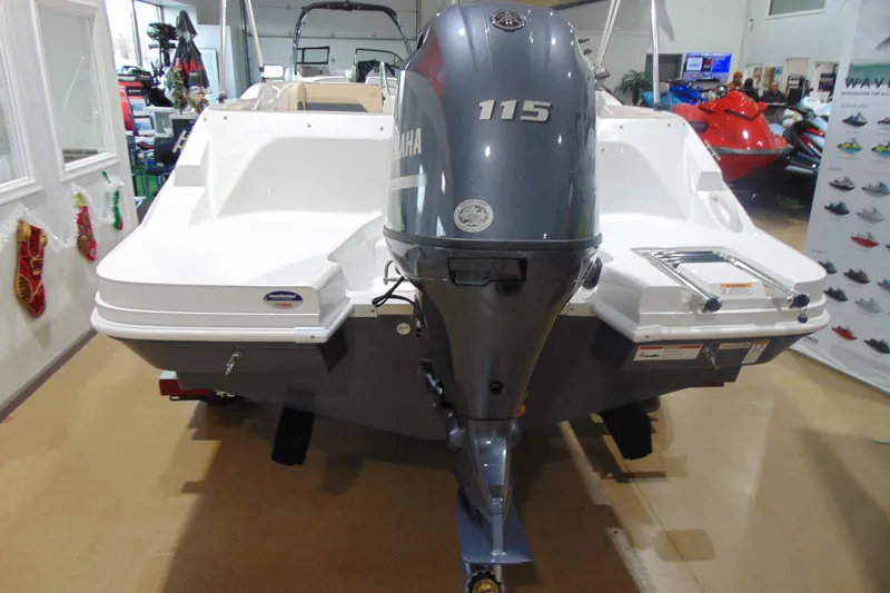 Slide: The Image of 2026 Hurricane SunDeck Sport 185 OB boat with Yamaha 115 outboard motor in showroom. - 4