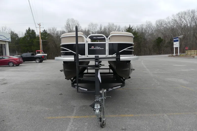Slide: The Image of 2018 Sun Tracker Party Barge 22 DLX pontoon boat on trailer in parking lot. - 3