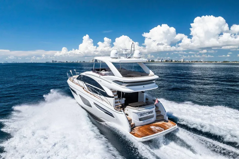 Slide: The Image of Luxury Princess 55 flybridge yacht cruising on open sea, 2022 model. - 100