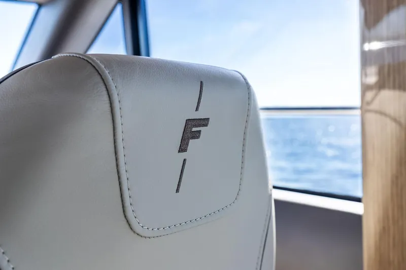 Slide: The Image of Luxurious interior of 2022 Princess 55 Flybridge yacht with ocean view. - 15