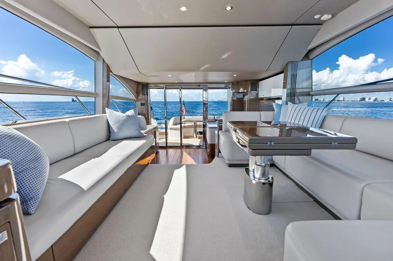Slide: The Image of Luxurious interior of 2022 Princess 55 Flybridge yacht with ocean view. - 2