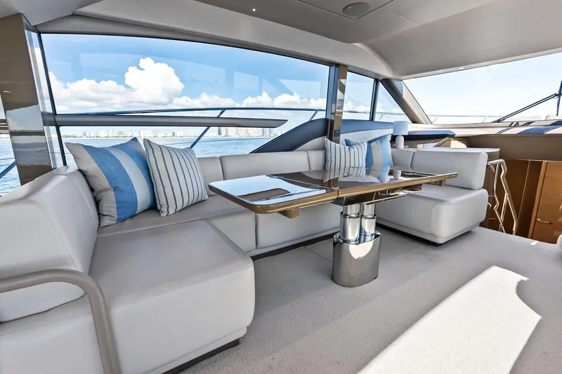 Slide: The Image of Luxurious interior of 2022 Princess 55 Flybridge yacht with elegant seating and ocean view. - 21