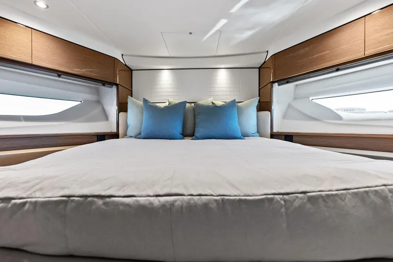 Slide: The Image of Luxurious bedroom interior of 2022 Princess 55 Flybridge yacht with modern design. - 29