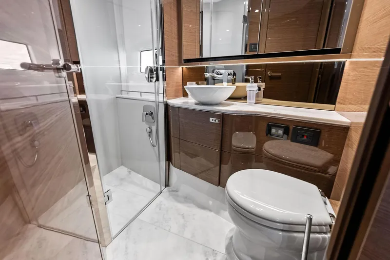 Slide: The Image of Luxurious bathroom in 2022 Princess 55 Flybridge yacht with modern fixtures and elegant design. - 34